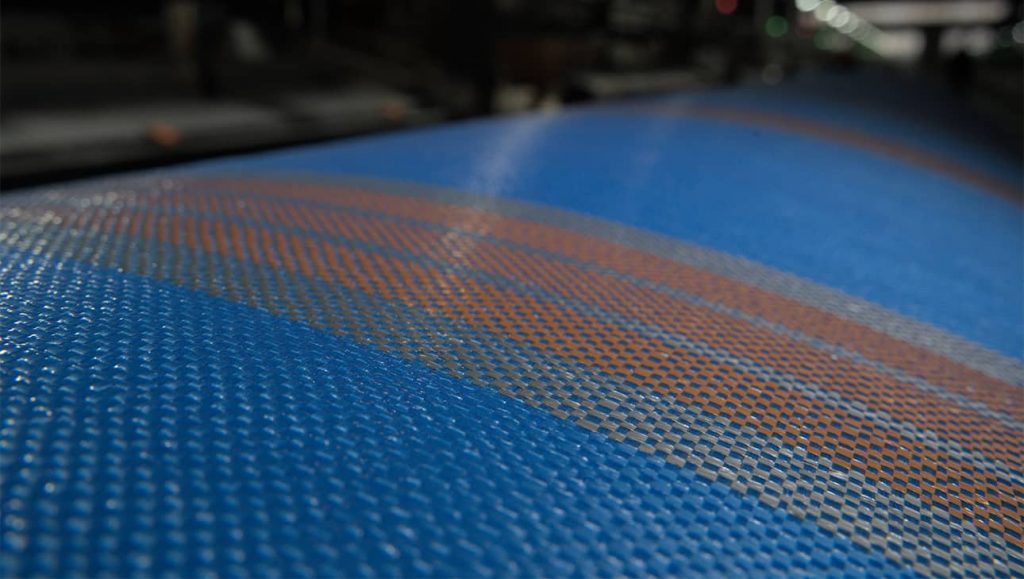 blue silver orange tarpaulin roll